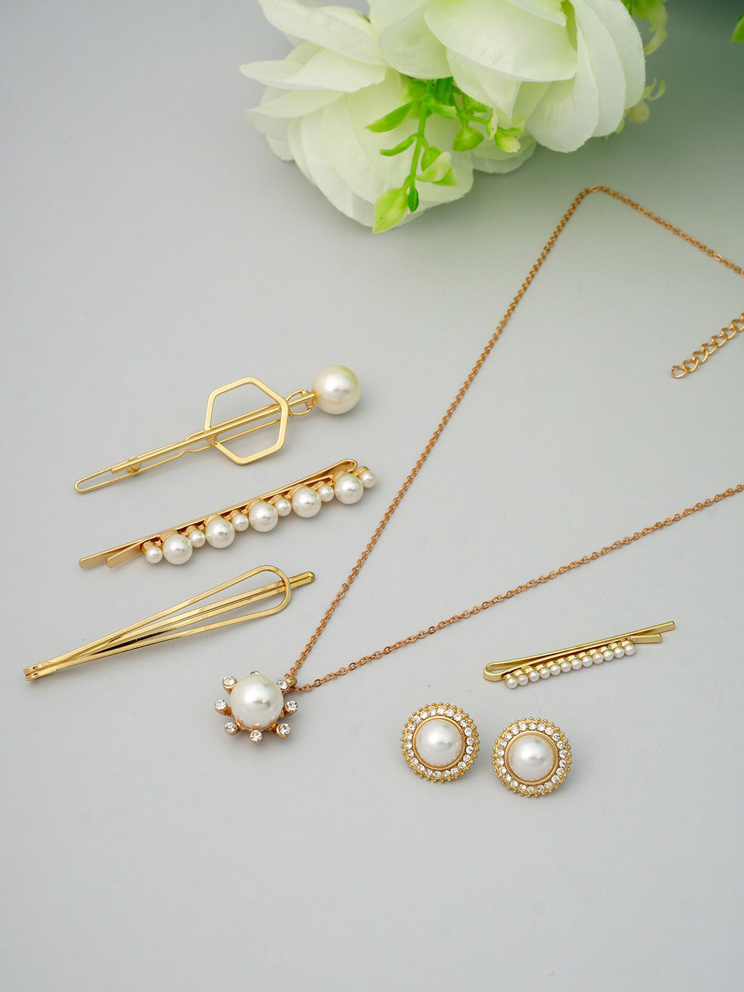 Ferosh Gold-Plated White Rhinestone Pearl Studded Jewellery Set
Ferosh Gold-Plated White Rhinestone Pearl Studded Jewellery Set