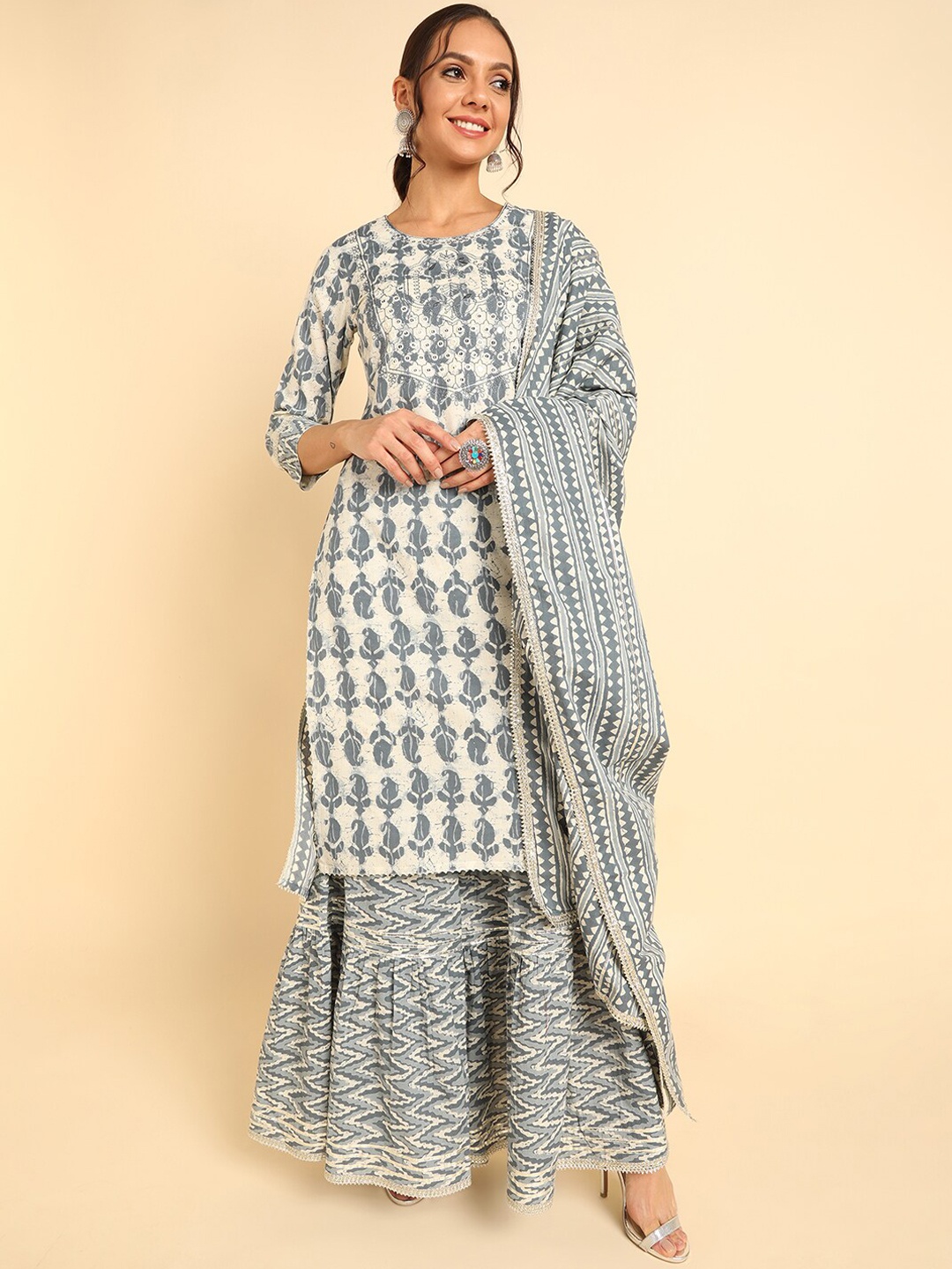 AHIKA Women Off White Ethnic Motifs Printed Pure Cotton Kurta with Sharara & With Dupatta
AHIKA Women Off White Ethnic Motifs Printed Pure Cotton Kurta with Sharara & With Dupatta