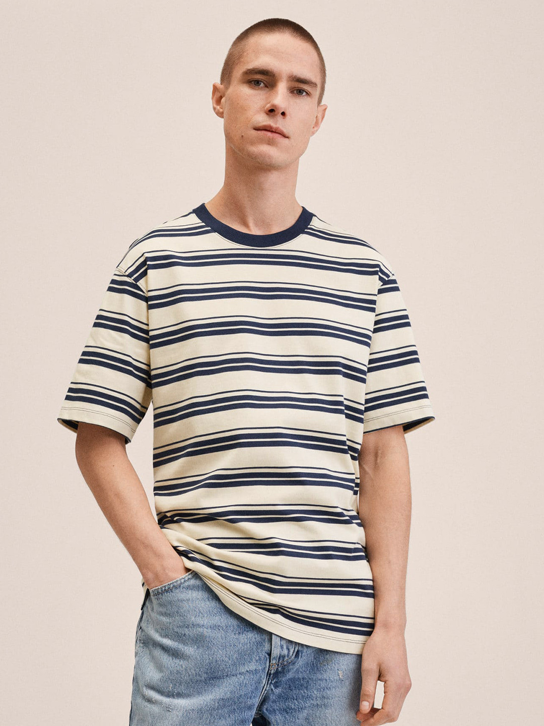 MANGO MAN Men Cream-Coloured & Black Striped Drop-Shoulder Sleeves Pure Cotton T-shirt
MANGO MAN Men Cream-Coloured & Black Striped Drop-Shoulder Sleeves Pure Cotton T-shirt