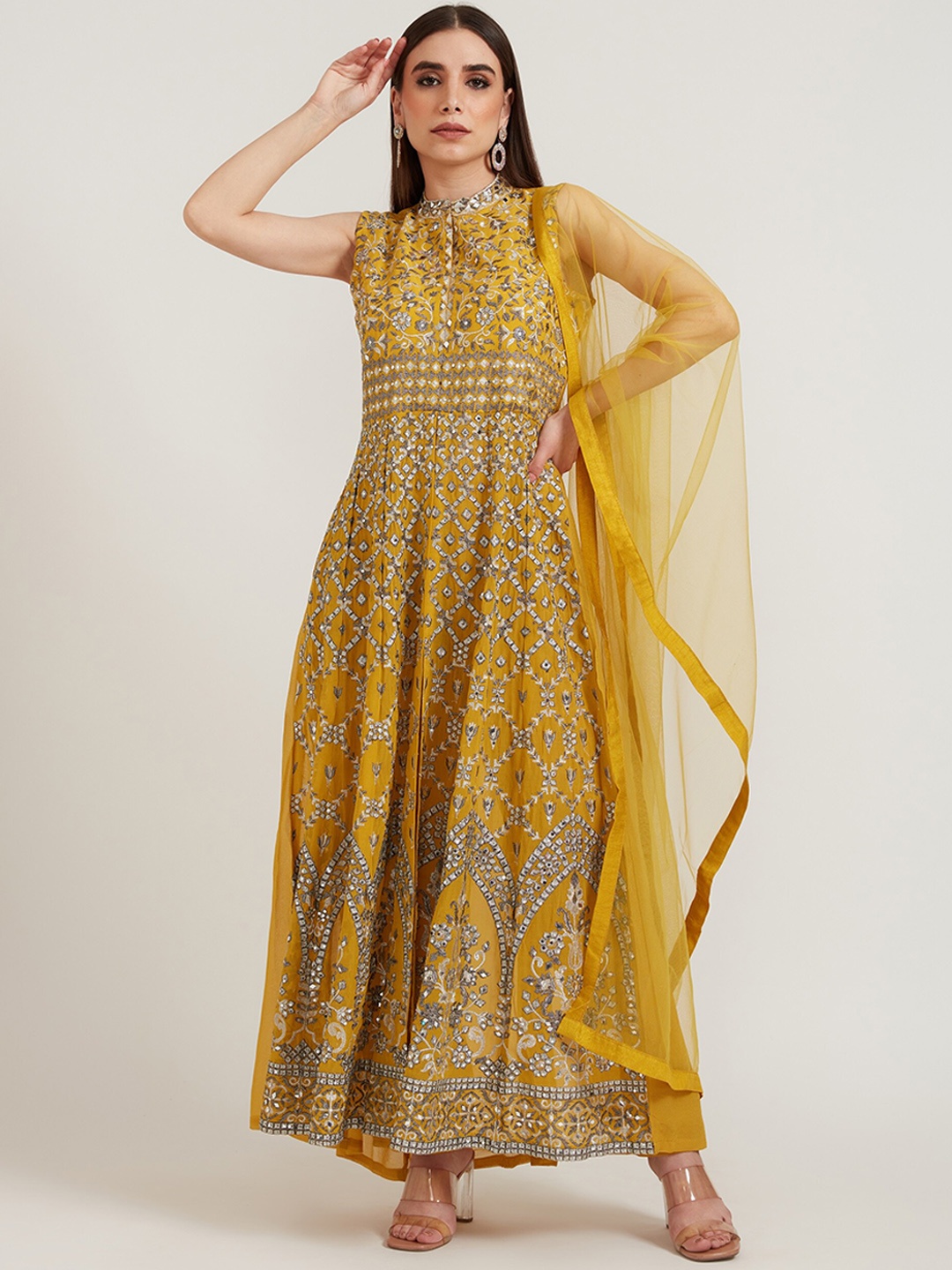 Neerus Women Mustard Yellow Ethnic Motifs Embroidered Empire Mirror Work Kurta with Trousers & With Dupatta
Neerus Women Mustard Yellow Ethnic Motifs Embroidered Empire Mirror Work Kurta with Trousers & With Dupatta