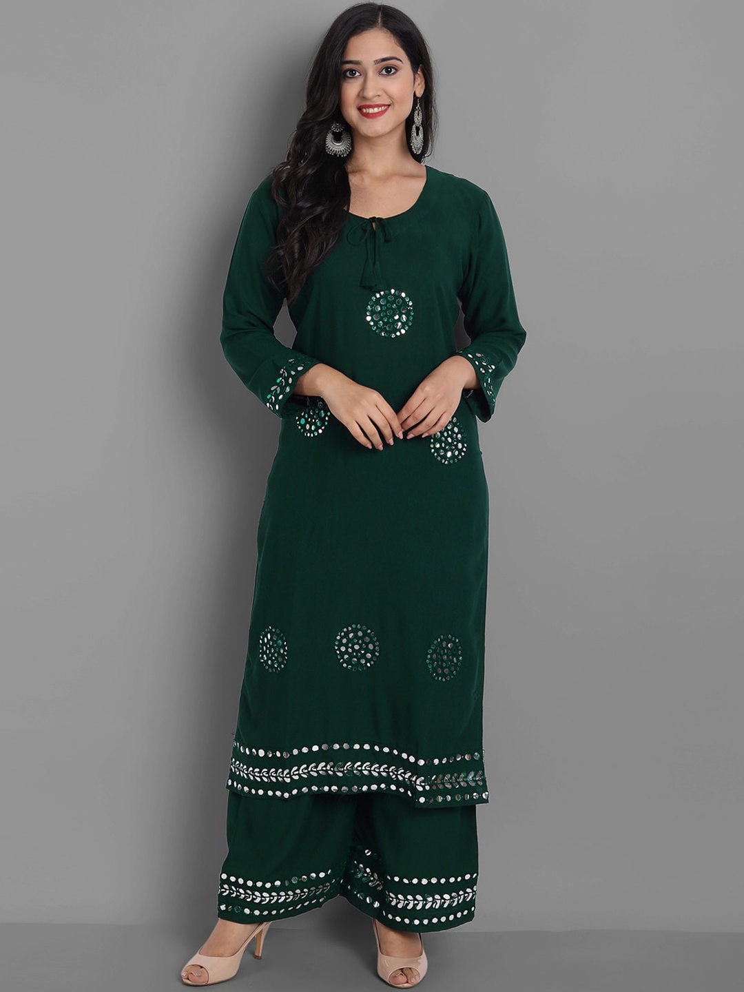 Ziva Fashion Women Green Ethnic Motifs Embroidered Mirror Work Kurta with Sharara
Ziva Fashion Women Green Ethnic Motifs Embroidered Mirror Work Kurta with Sharara