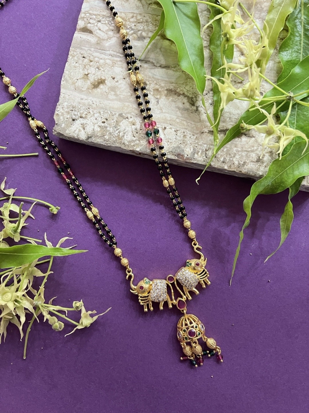 Digital Dress Room Women Gold-Plated Stone-Studded & Beaded Elephant Pendant Mangalsutra
Digital Dress Room Women Gold-Plated Stone-Studded & Beaded Elephant Pendant Mangalsutra