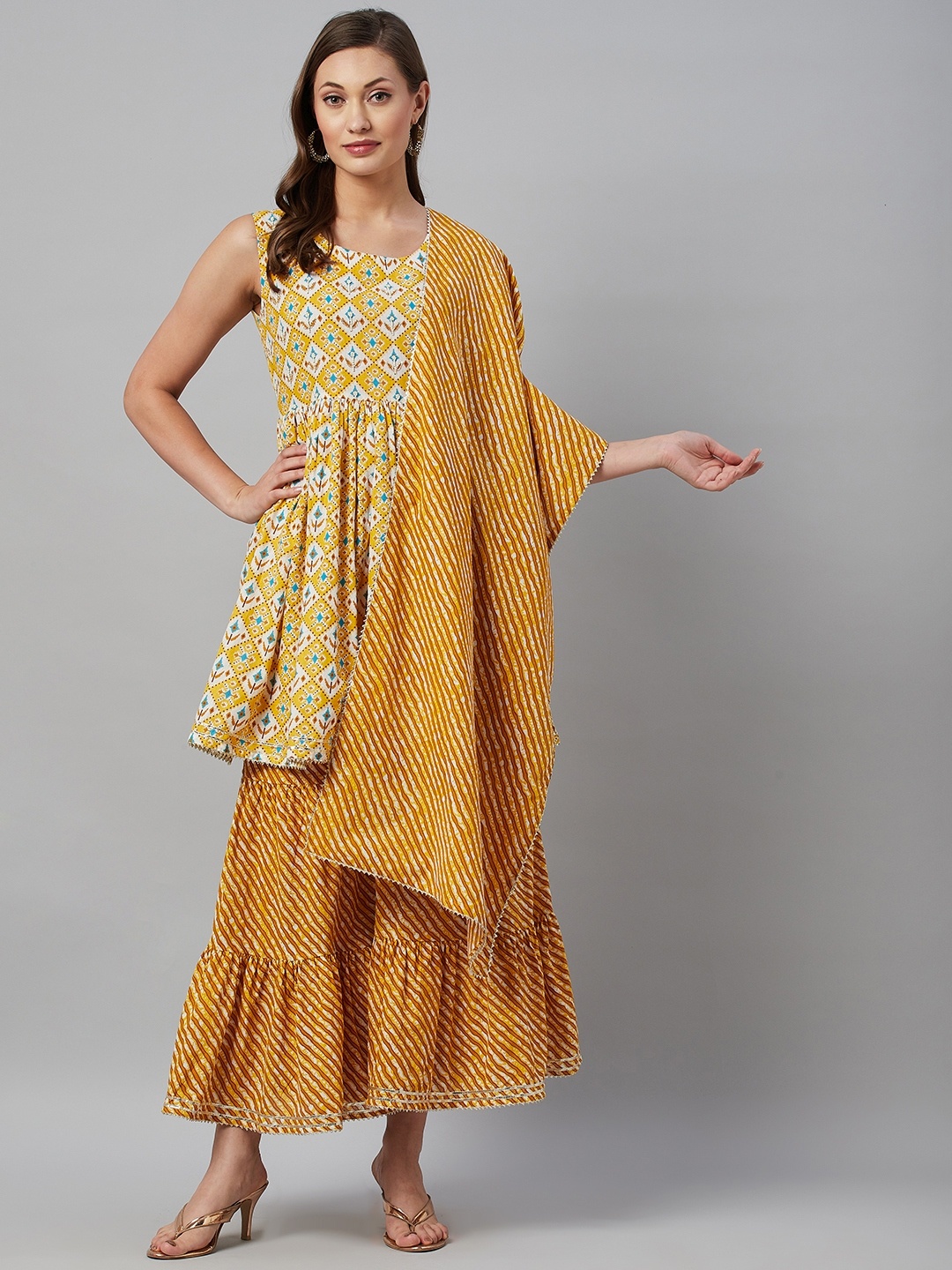 HIGHLIGHT FASHION EXPORT Women Yellow Ethnic Motifs Cotton Kurta with Sharara & Dupatta
HIGHLIGHT FASHION EXPORT Women Yellow Ethnic Motifs Cotton Kurta with Sharara & Dupatta