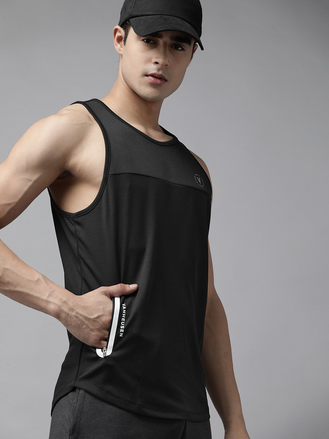 Van Heusen Flex Men Black Solid Active Fit T-shirt 
Van Heusen Flex Men Black Solid Active Fit T-shirt