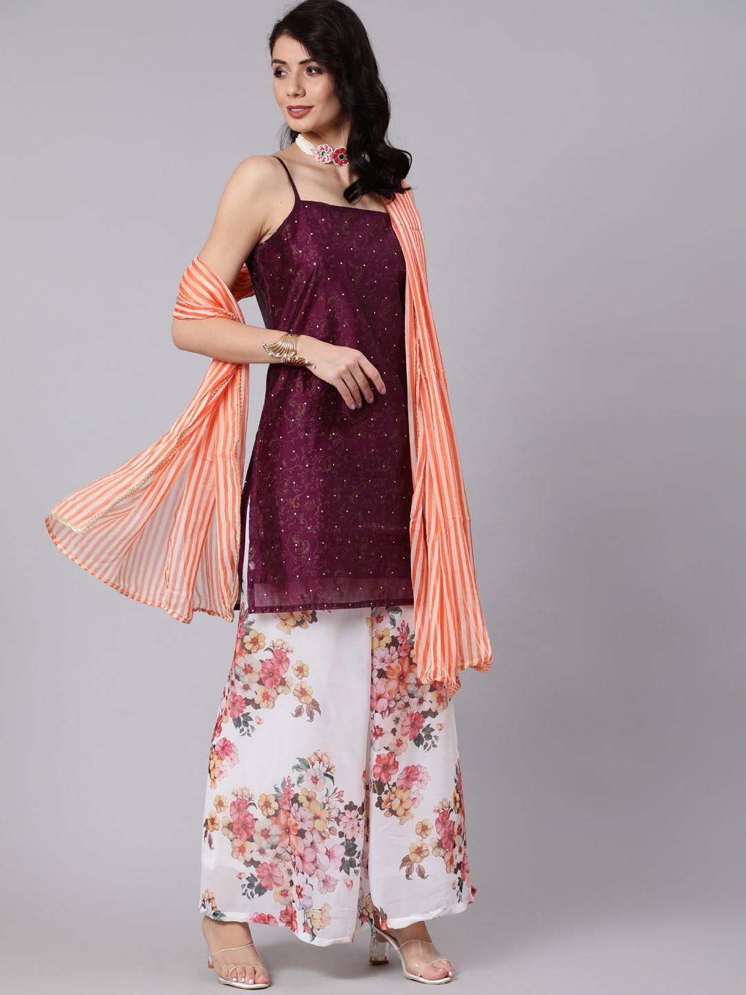 Awadhi Women Purple Striped Panelled Chanderi Silk Kurti with Sharara & With Dupatta
Awadhi Women Purple Striped Panelled Chanderi Silk Kurti with Sharara & With Dupatta