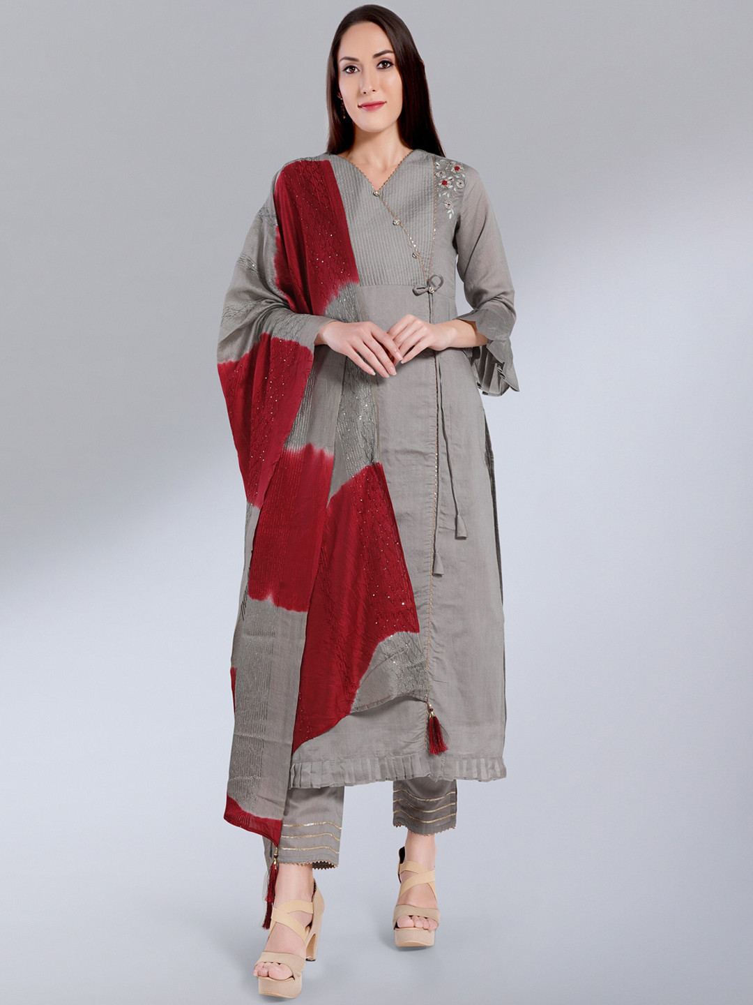 MADHURAM Women Grey Floral Embroidered Panelled Chanderi Silk Kurta with Churidar & With Dupatta
MADHURAM Women Grey Floral Embroidered Panelled Chanderi Silk Kurta with Churidar & With Dupatta