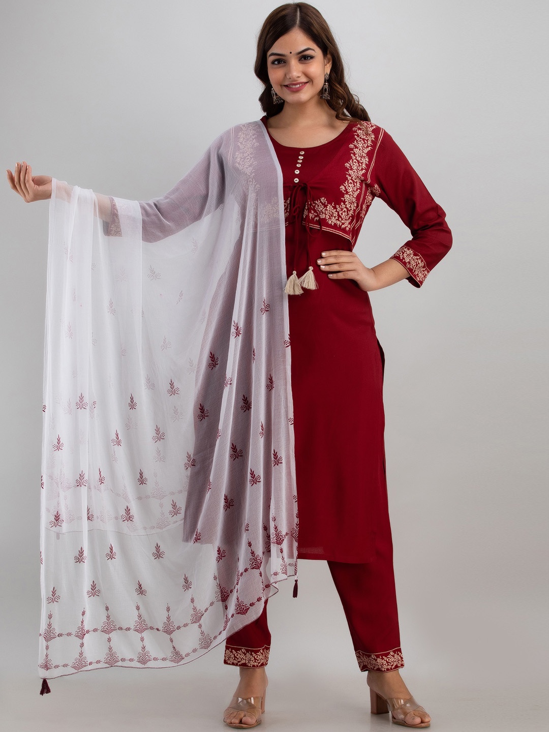 Kurtipedia Women Maroon Floral Embroidered Panelled Beads and Stones Kurti with Trousers & With Dupatta
Kurtipedia Women Maroon Floral Embroidered Panelled Beads and Stones Kurti with Trousers & With Dupatta