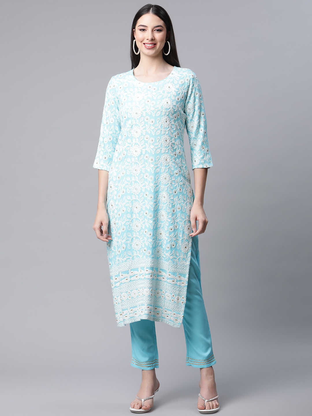 AMIRAS INDIAN ETHNIC WEAR Women Blue Floral Embroidered Thread Work Kurta with Trousers
AMIRAS INDIAN ETHNIC WEAR Women Blue Floral Embroidered Thread Work Kurta with Trousers