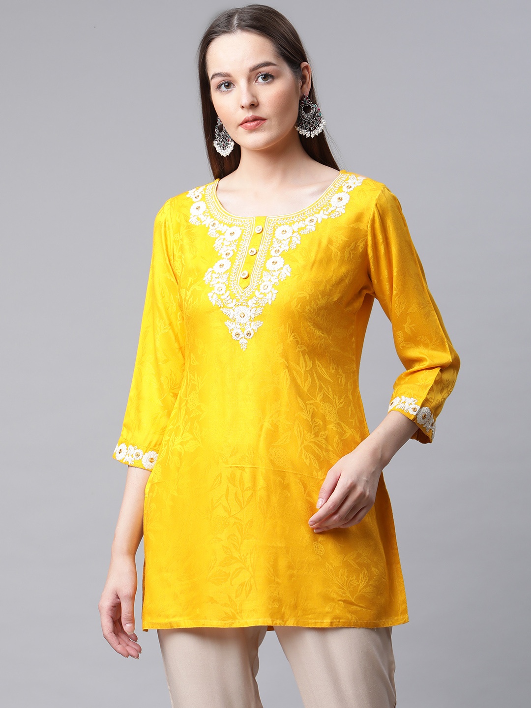 AMIRAS INDIAN ETHNIC WEAR Yellow Floral Yoke Design Thread Work Modal Thread Work Kurti
AMIRAS INDIAN ETHNIC WEAR Yellow Floral Yoke Design Thread Work Modal Thread Work Kurti