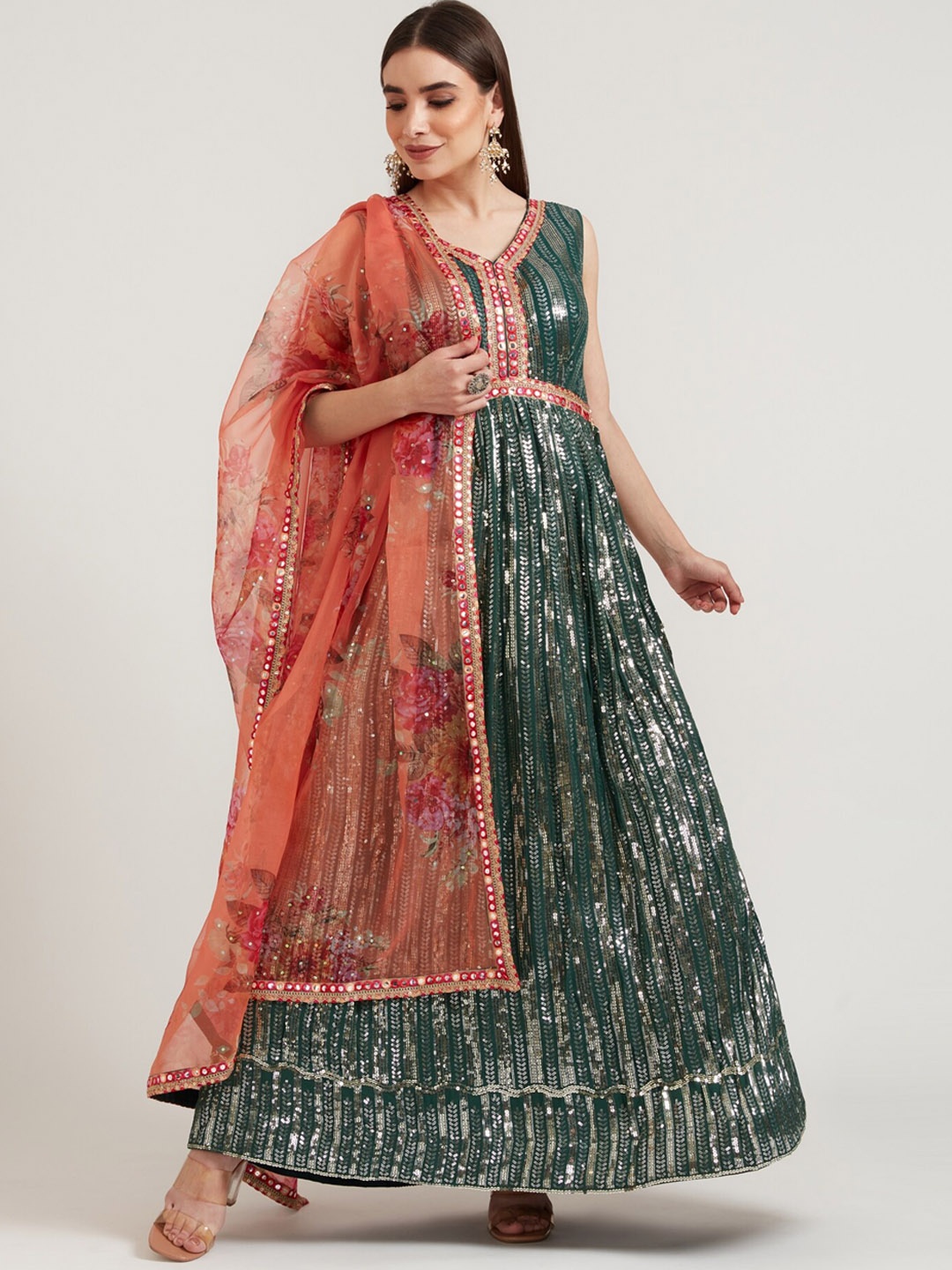 Neerus Women Green Ethnic Motifs Embroidered Sequinned Kurta with Trousers & With Dupatta
Neerus Women Green Ethnic Motifs Embroidered Sequinned Kurta with Trousers & With Dupatta