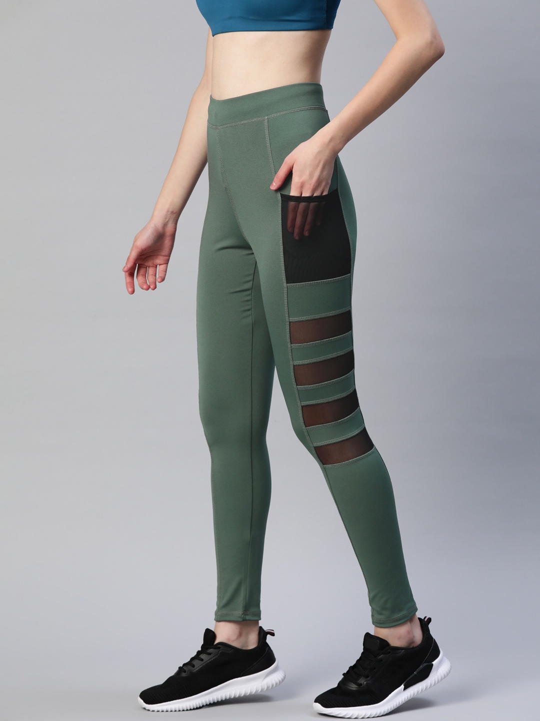 Blinkin Women Olive Green Rapid Dry Tights With Breathable Mesh Panels & Side Pockets
Blinkin Women Olive Green Rapid Dry Tights With Breathable Mesh Panels & Side Pockets