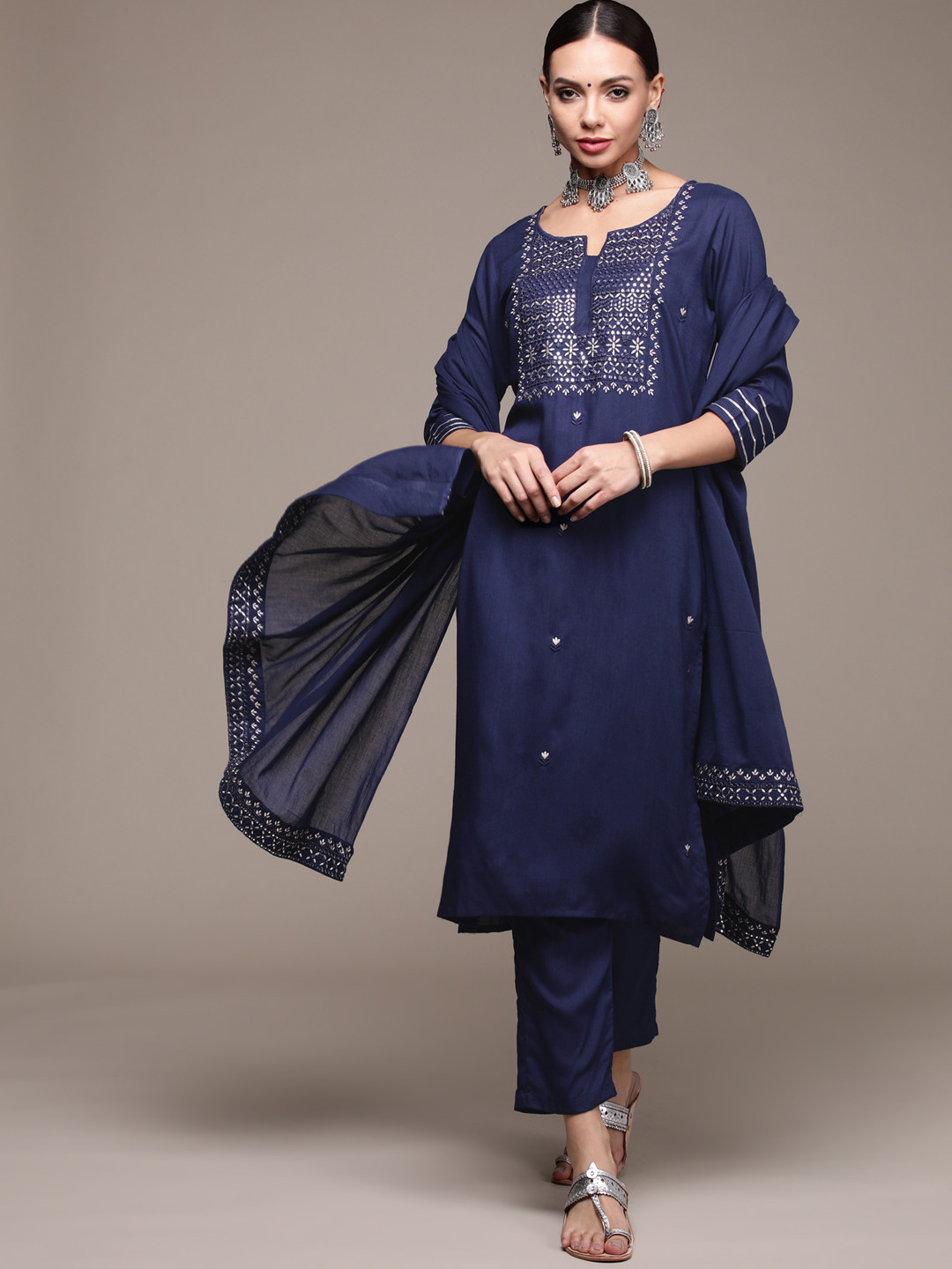 Anubhutee Women Navy Blue Floral Embroidered Mirror Work Kurta with Trousers & With Dupatta
Anubhutee Women Navy Blue Floral Embroidered Mirror Work Kurta with Trousers & With Dupatta