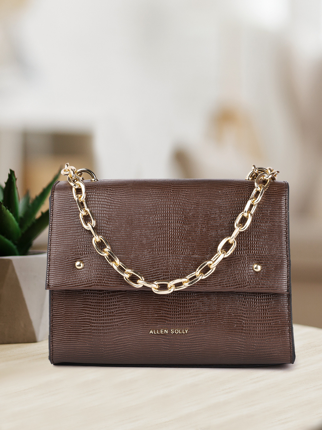 Allen Solly Brown Textured PU Oversized Structured Handheld Bag
Allen Solly Brown Textured PU Oversized Structured Handheld Bag