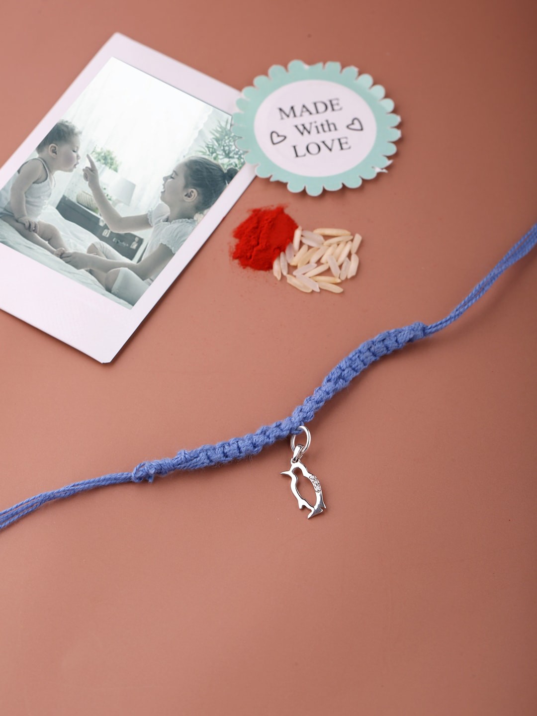 ADORN by Nikita Ladiwala Kids Silver-Plated & Blue Rakhi With Raksha Bandhan Greeting Card
ADORN by Nikita Ladiwala Kids Silver-Plated & Blue Rakhi With Raksha Bandhan Greeting Card