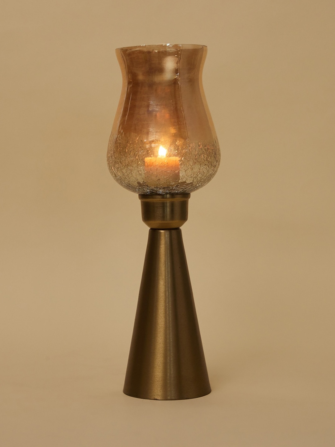 Home Centre Gold Toned & White Solid Mosaic Hurricane Glass Candle Holder With Metal Stand
Home Centre Gold Toned & White Solid Mosaic Hurricane Glass Candle Holder With Metal Stand