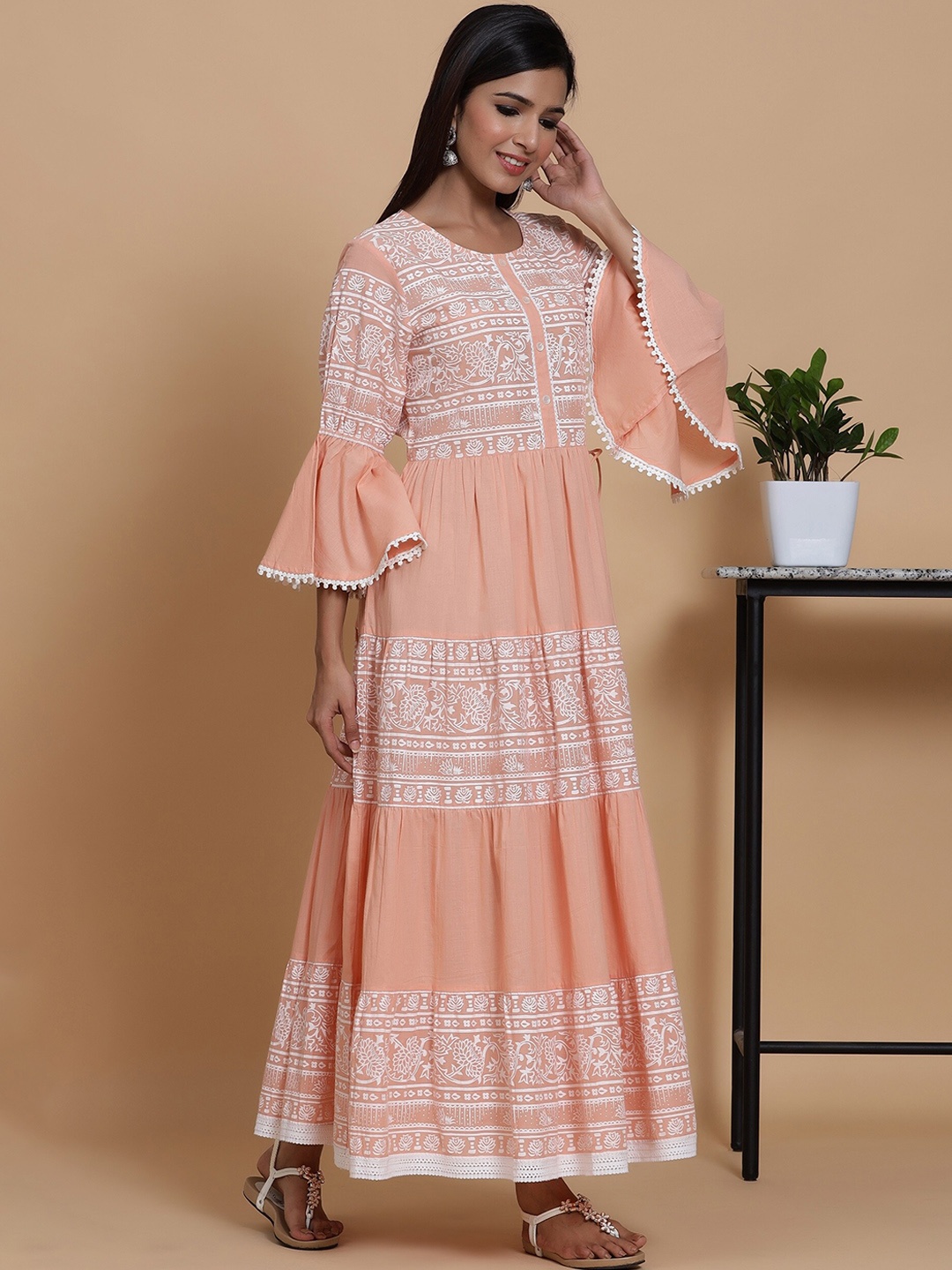 mirari Women Peach-Coloured & White Ethnic Motifs Printed Bell Sleeves Floral Anarkali Kurta
mirari Women Peach-Coloured & White Ethnic Motifs Printed Bell Sleeves Floral Anarkali Kurta