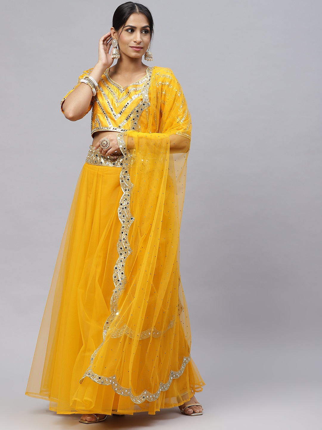 Readiprint Fashions Mustard Yellow Mirror Work Unstitched Lehenga & Blouse With Dupatta
Readiprint Fashions Mustard Yellow Mirror Work Unstitched Lehenga & Blouse With Dupatta