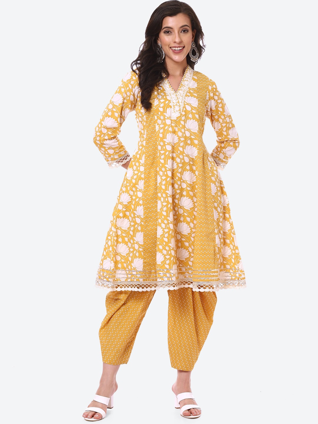 Meena Bazaar Women Mustard Yellow Ethnic Motifs Printed Panelled Pure Cotton Kurta with Dhoti Pants
Meena Bazaar Women Mustard Yellow Ethnic Motifs Printed Panelled Pure Cotton Kurta with Dhoti Pants