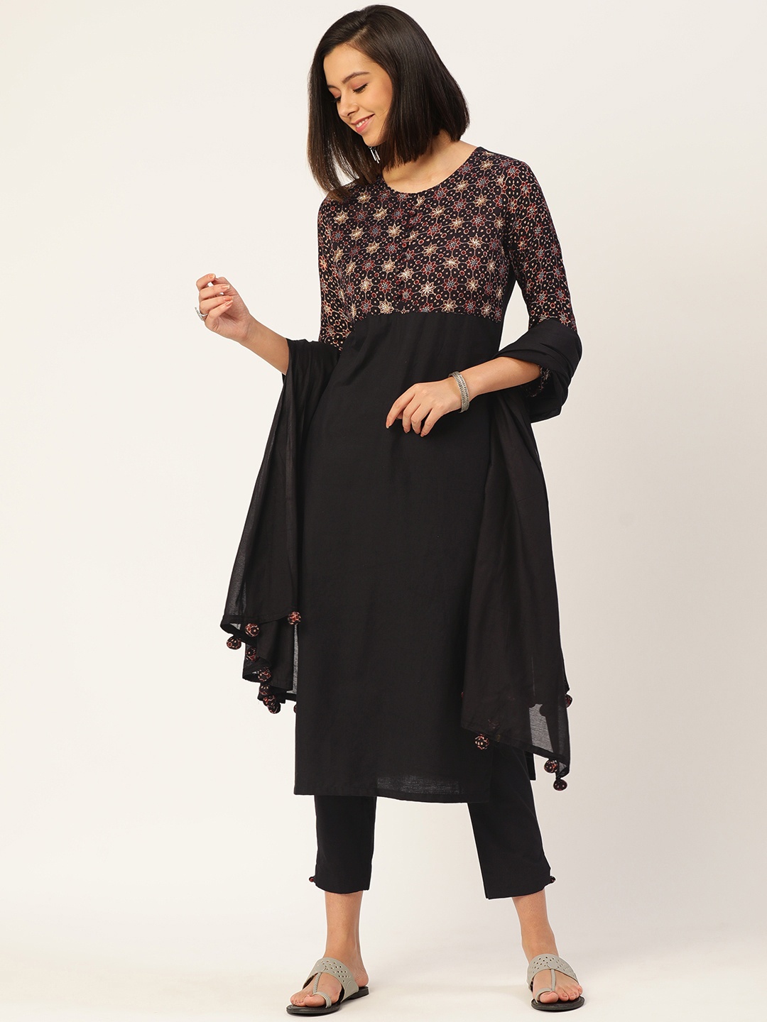 Saanjh Women Black Floral Yoke Design Beads and Stones Pure Cotton Kurta with Trousers & With Dupatta
Saanjh Women Black Floral Yoke Design Beads and Stones Pure Cotton Kurta with Trousers & With Dupatta