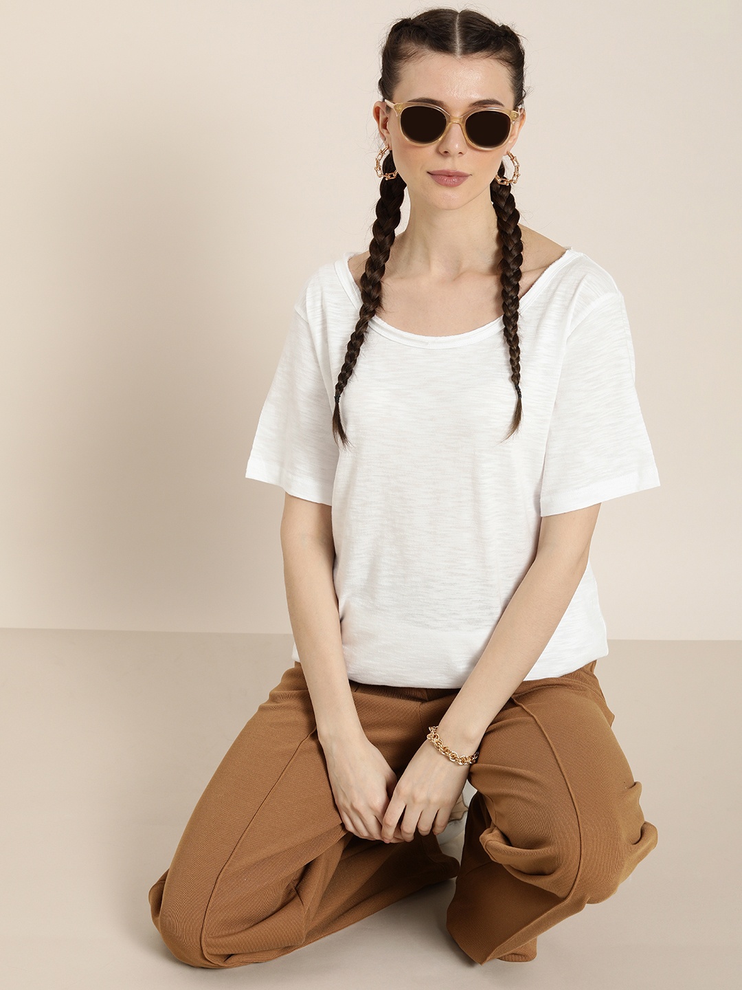 DILLINGER Women White Solid Drop-Shoulder Sleeves Pure Cotton Oversized T-shirt
DILLINGER Women White Solid Drop-Shoulder Sleeves Pure Cotton Oversized T-shirt