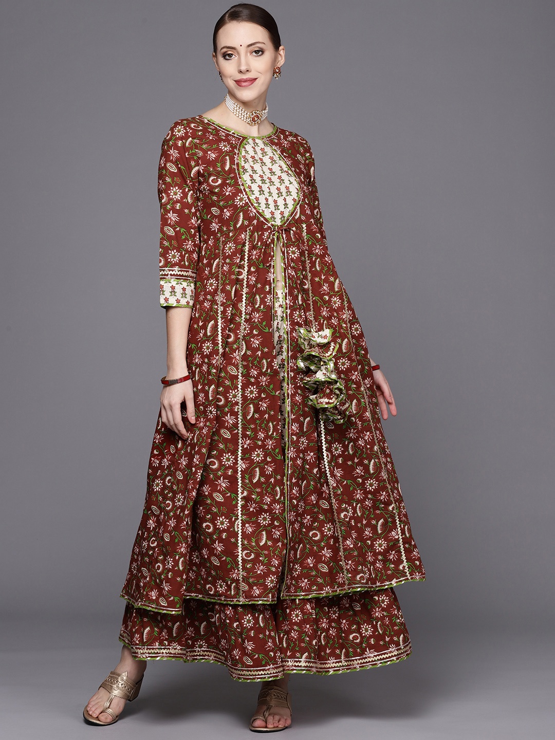 Varanga Women Brown Floral Printed Panelled Gotta Patti Pure Cotton Kurta with Sharara
Varanga Women Brown Floral Printed Panelled Gotta Patti Pure Cotton Kurta with Sharara