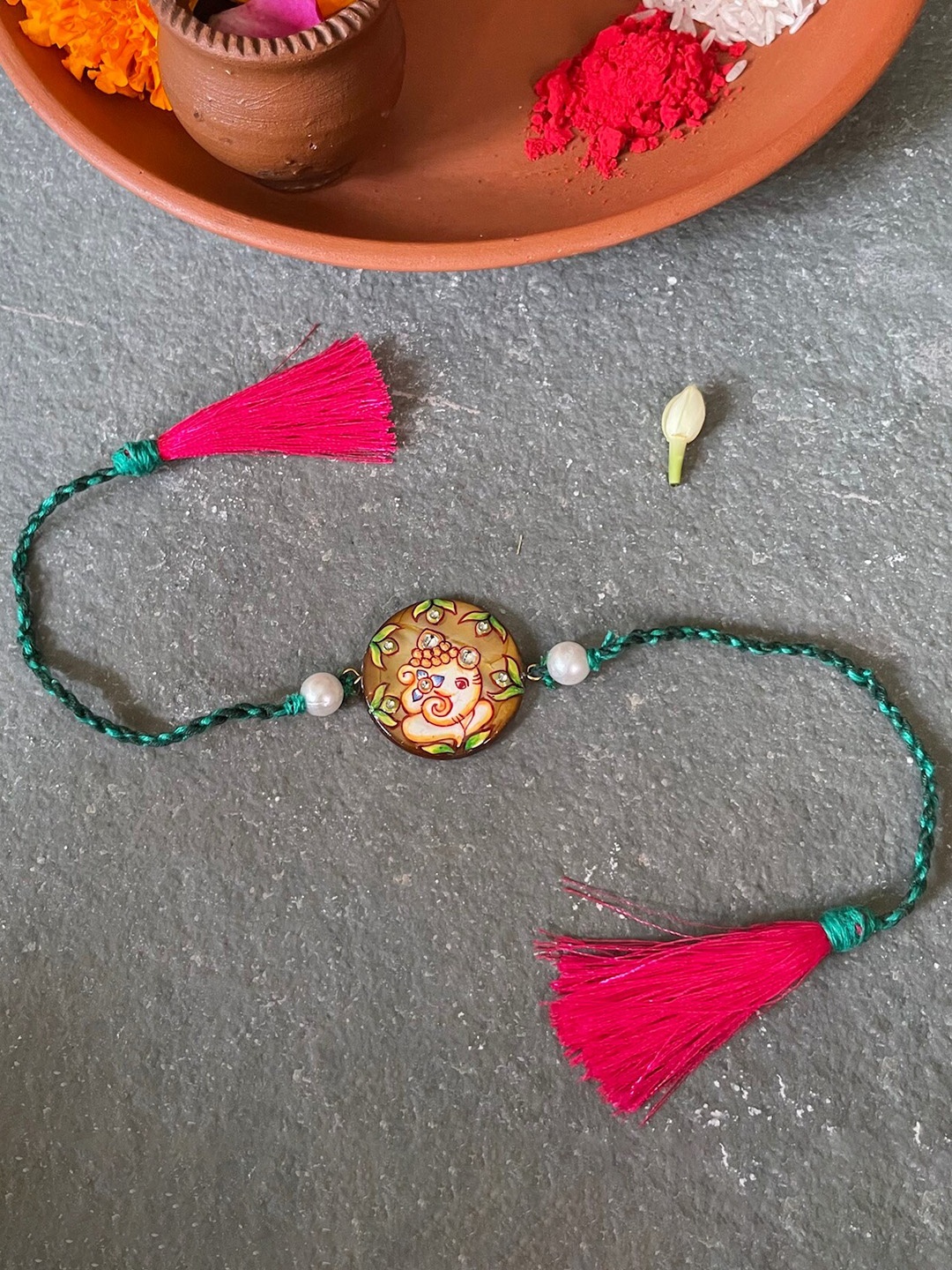 Mitali Jain Green & Red Ganesh Rakhi