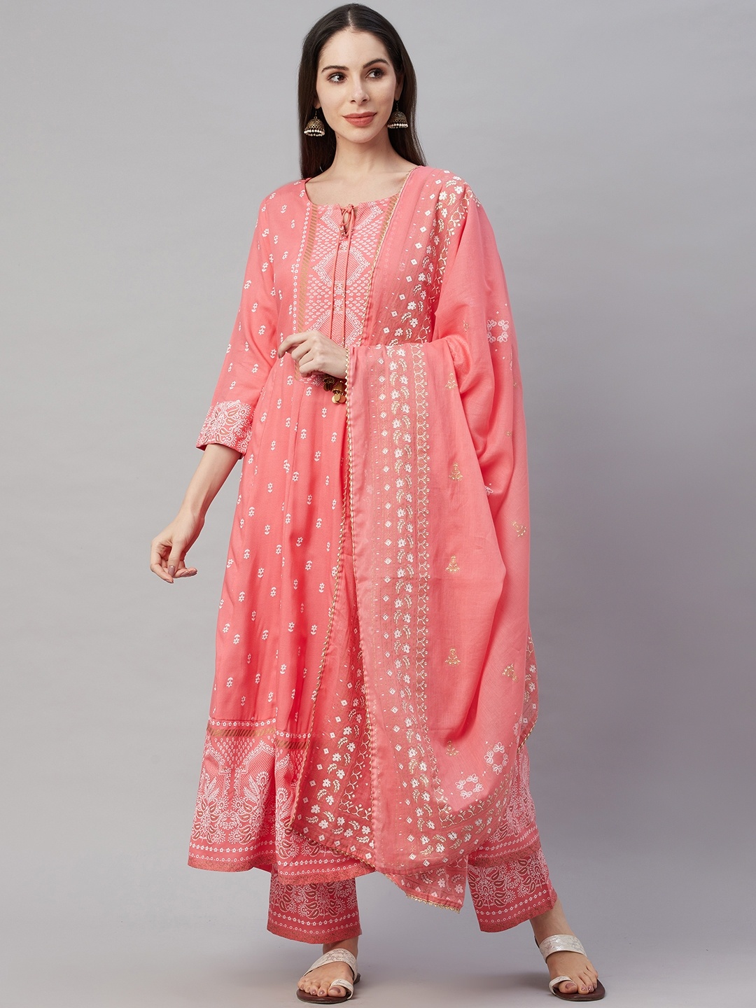 AMIRAS INDIAN ETHNIC WEAR Women Peach-Coloured Ethnic Motifs Printed Kurta with Palazzos & With Dupatta
AMIRAS INDIAN ETHNIC WEAR Women Peach-Coloured Ethnic Motifs Printed Kurta with Palazzos & With Dupatta