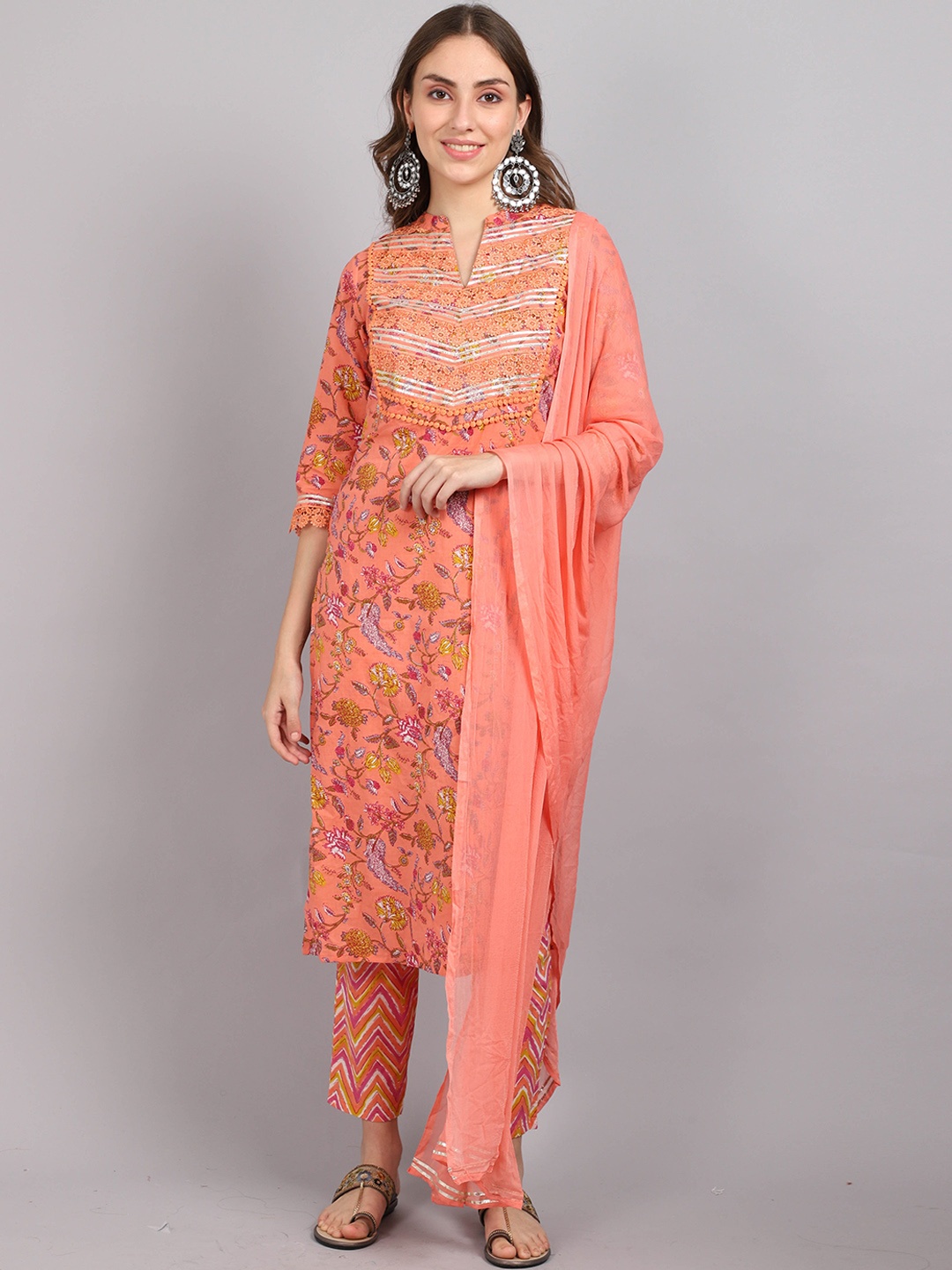 Roly Poly Women Peach & Red Floral Printed Cotton Kurta with Trousers & With Dupatta
Roly Poly Women Peach & Red Floral Printed Cotton Kurta with Trousers & With Dupatta