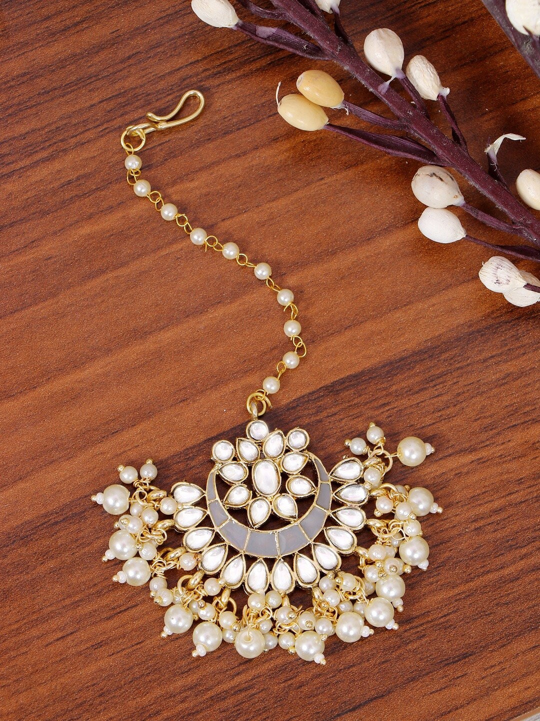 Crunchy Fashion Gold-Plated Grey & White Kundan Studded & Pearl Beaded Meenakari Maang Tikka
Crunchy Fashion Gold-Plated Grey & White Kundan Studded & Pearl Beaded Meenakari Maang Tikka