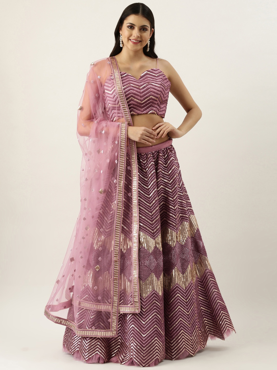 panchhi Lavender & Golden Net Sequinned Semi-Stitched Lehenga & Blouse with Dupatta
panchhi Lavender & Golden Net Sequinned Semi-Stitched Lehenga & Blouse with Dupatta