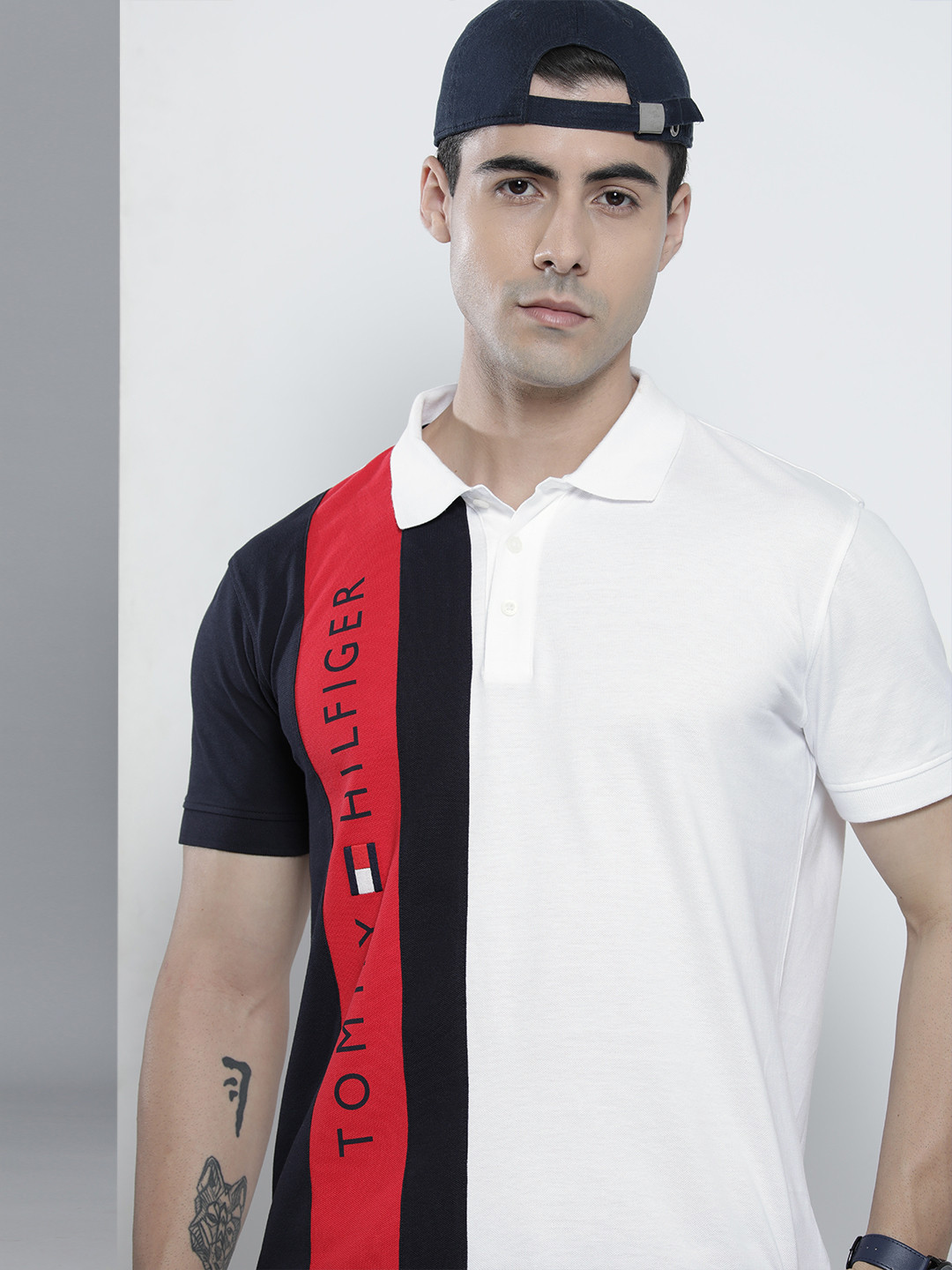 Tommy Hilfiger Men White & Navy Blue Colourblocked Organic Cotton Polo Collar T-shirt
Tommy Hilfiger Men White & Navy Blue Colourblocked Organic Cotton Polo Collar T-shirt