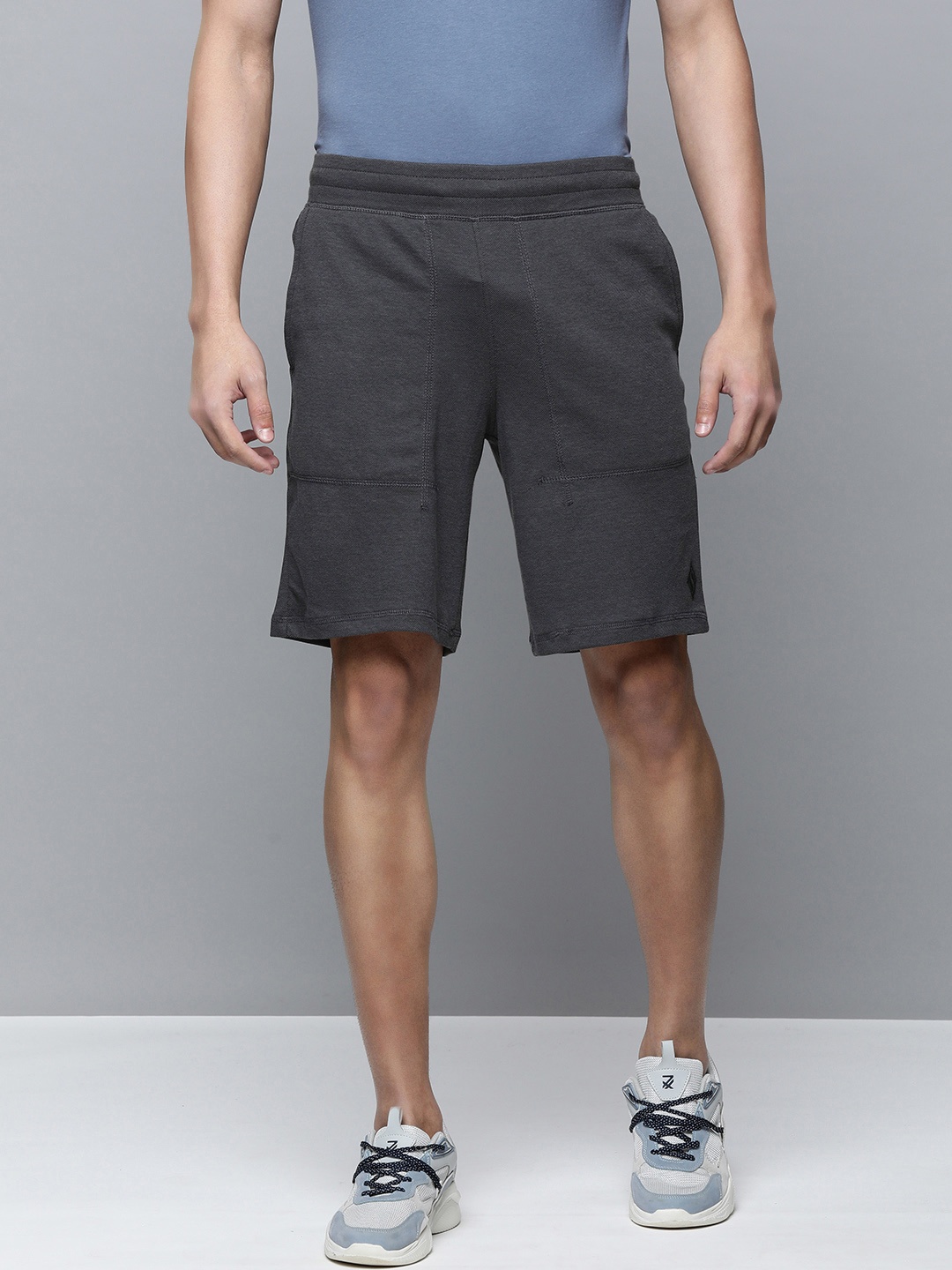 Skechers Men Charcoal Black Solid Sports Shorts with e-Dry Technology Technology
Skechers Men Charcoal Black Solid Sports Shorts with e-Dry Technology Technology