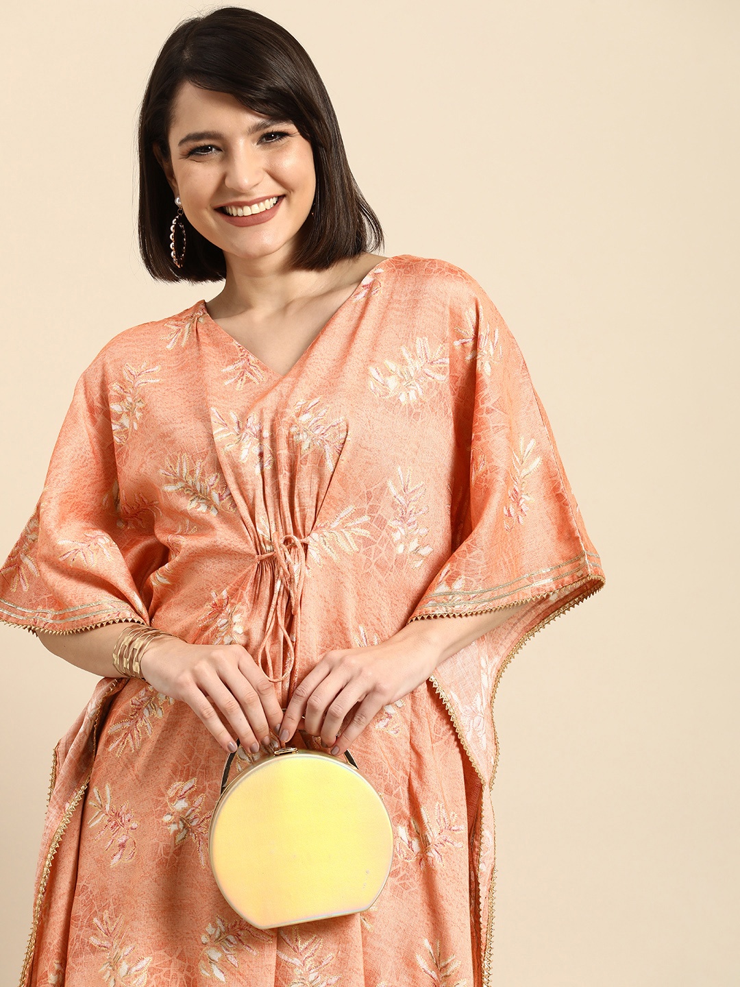 Anouk Women Peach-Coloured & Gold-Toned Floral Printed Extended Sleeves Gotta Patti Kaftan Kurta
Anouk Women Peach-Coloured & Gold-Toned Floral Printed Extended Sleeves Gotta Patti Kaftan Kurta