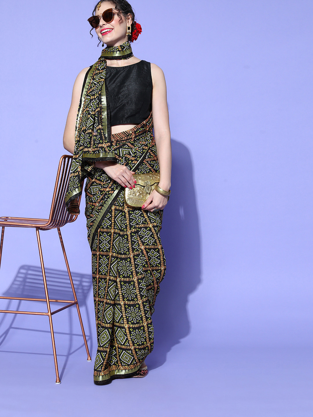 Mitera Bandhani Saree with Woven Design border, Black 
Mitera Bandhani Saree with Woven Design border, Black