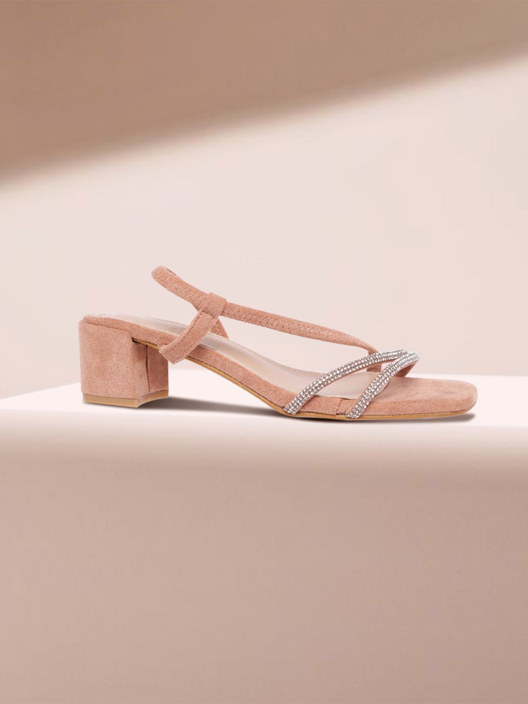 Van Heusen Woman Peach-Coloured with a Tinge of Tan Suede Finish Embellished Block Heels
Van Heusen Woman Peach-Coloured with a Tinge of Tan Suede Finish Embellished Block Heels