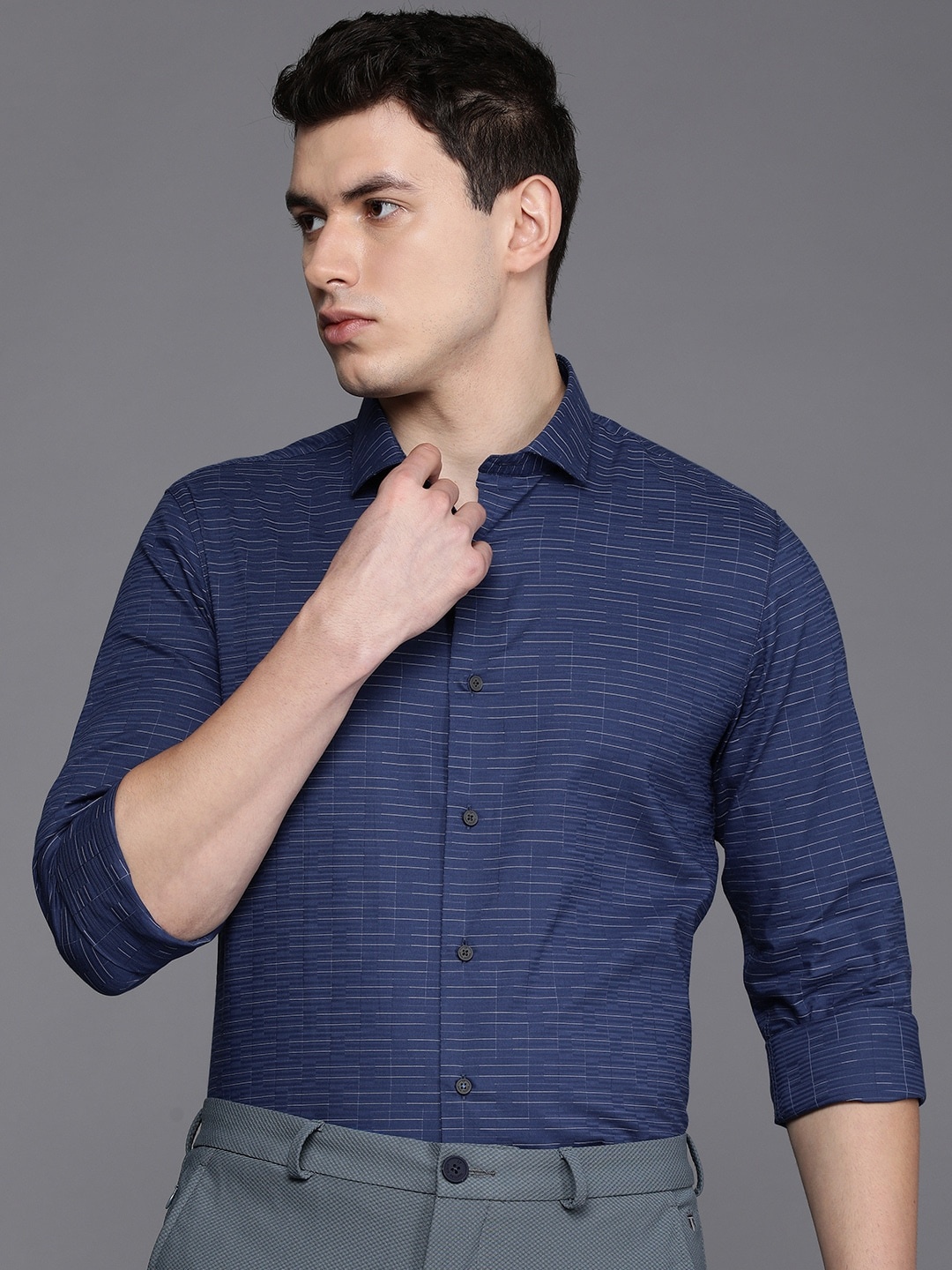 Louis Philippe Ath.Work Men Navy Blue Slim Fit Horizontal Stripes Printed Casual Shirt
Louis Philippe Ath.Work Men Navy Blue Slim Fit Horizontal Stripes Printed Casual Shirt