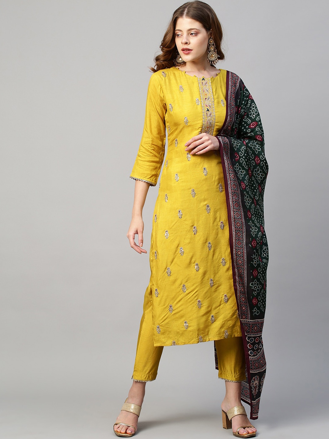 FASHOR Women Yellow Embroidered Angrakha Sequinned Kurti with Trousers & With Dupatta
FASHOR Women Yellow Embroidered Angrakha Sequinned Kurti with Trousers & With Dupatta
