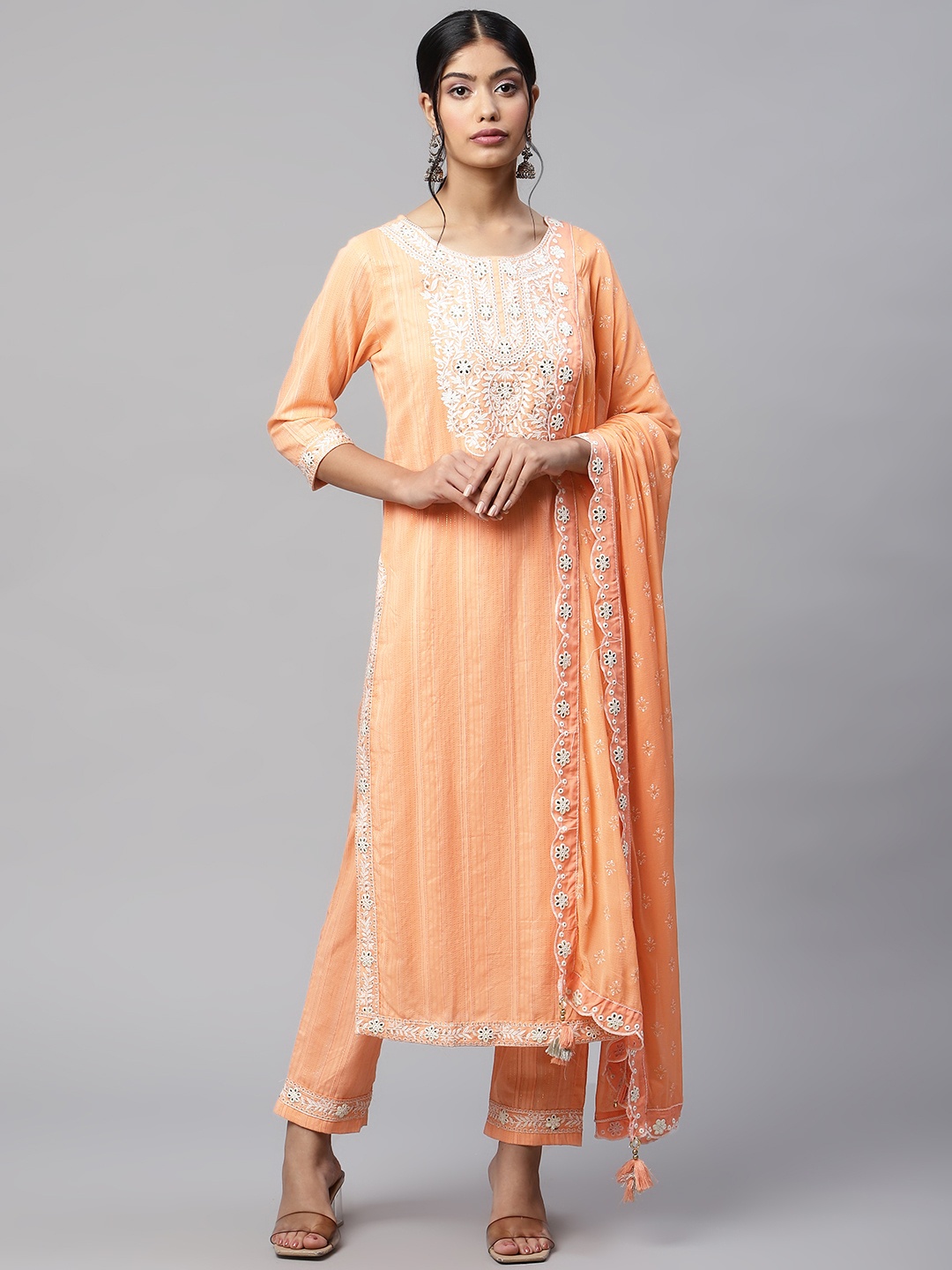 Readiprint Fashions Women Peach-Coloured Ethnic Motifs Kurta with Trousers & Dupatta
Readiprint Fashions Women Peach-Coloured Ethnic Motifs Kurta with Trousers & Dupatta