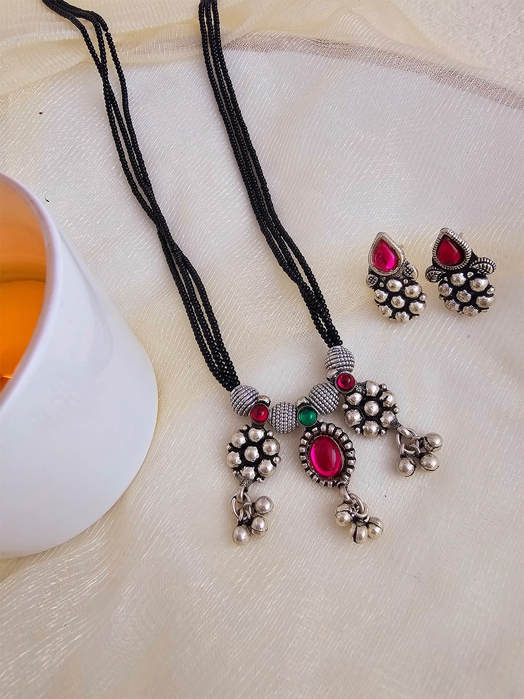 Binnis Wardrobe Silver-Plated Black Stone Studded & Beaded Mangalsutra Jewellery Set
Binnis Wardrobe Silver-Plated Black Stone Studded & Beaded Mangalsutra Jewellery Set
