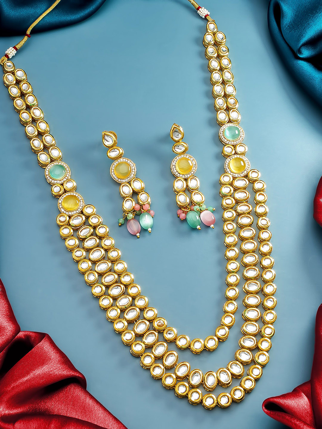 aadita Gold-Plated White & Pink Kundan-Studded & Beaded Jewellery Set
aadita Gold-Plated White & Pink Kundan-Studded & Beaded Jewellery Set