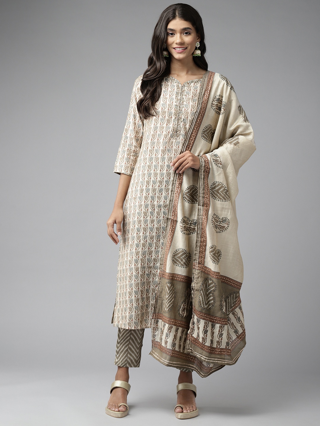 Yufta Women Beige Ethnic Motifs Printed Aari Work Kurta with Trousers & With Dupatta
Yufta Women Beige Ethnic Motifs Printed Aari Work Kurta with Trousers & With Dupatta