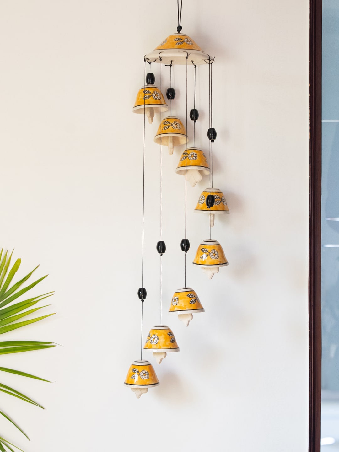 ExclusiveLane Floral Symphonies Hand-Painted Decorative Ceramic Hanging Bells Windchimes, Yellow
ExclusiveLane Floral Symphonies Hand-Painted Decorative Ceramic Hanging Bells Windchimes, Yellow