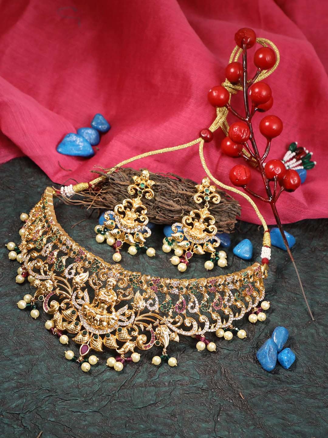 Adwitiya Collection 24CT Gold-Plated White & Green Stone-Studded Pearl Beaded Temple Jewellery Set
Adwitiya Collection 24CT Gold-Plated White & Green Stone-Studded Pearl Beaded Temple Jewellery Set