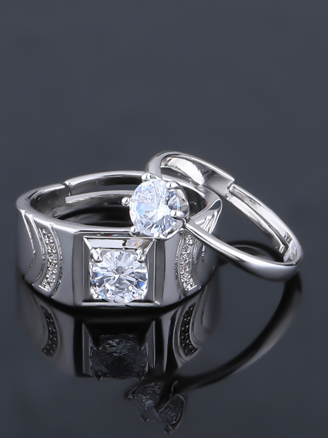 Silver Shine Set Of 2 Silver-Plated & White Diamond-Studded Couple Adjustable Finger Rings
Silver Shine Set Of 2 Silver-Plated & White Diamond-Studded Couple Adjustable Finger Rings