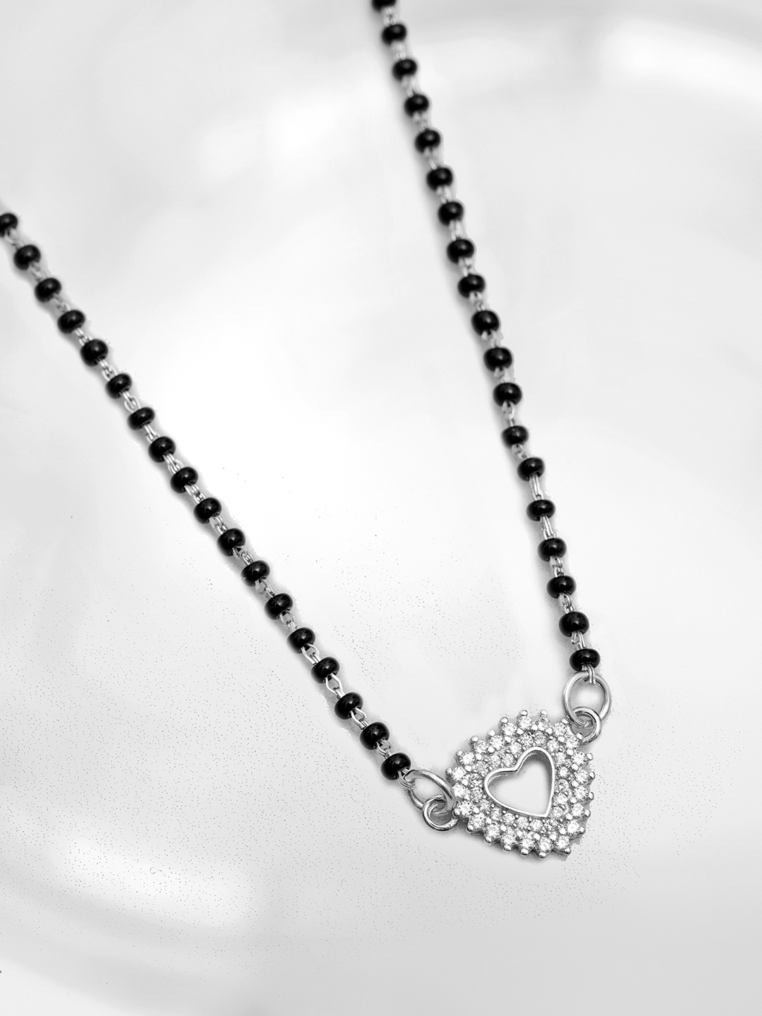 Zavya 925 Sterling Silver Rhodium-Plated Artificial Stones & Beads Mangalsutra, Black
Zavya 925 Sterling Silver Rhodium-Plated Artificial Stones & Beads Mangalsutra, Black