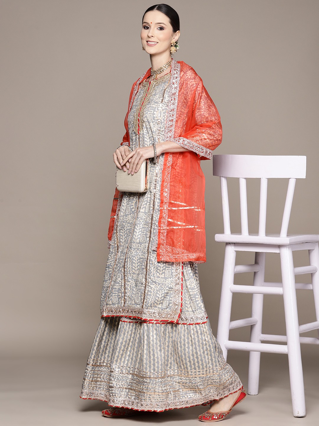 Ishin Women Grey Ethnic Motifs Embroidered Gotta Patti Kurta with Sharara & With Dupatta
Ishin Women Grey Ethnic Motifs Embroidered Gotta Patti Kurta with Sharara & With Dupatta