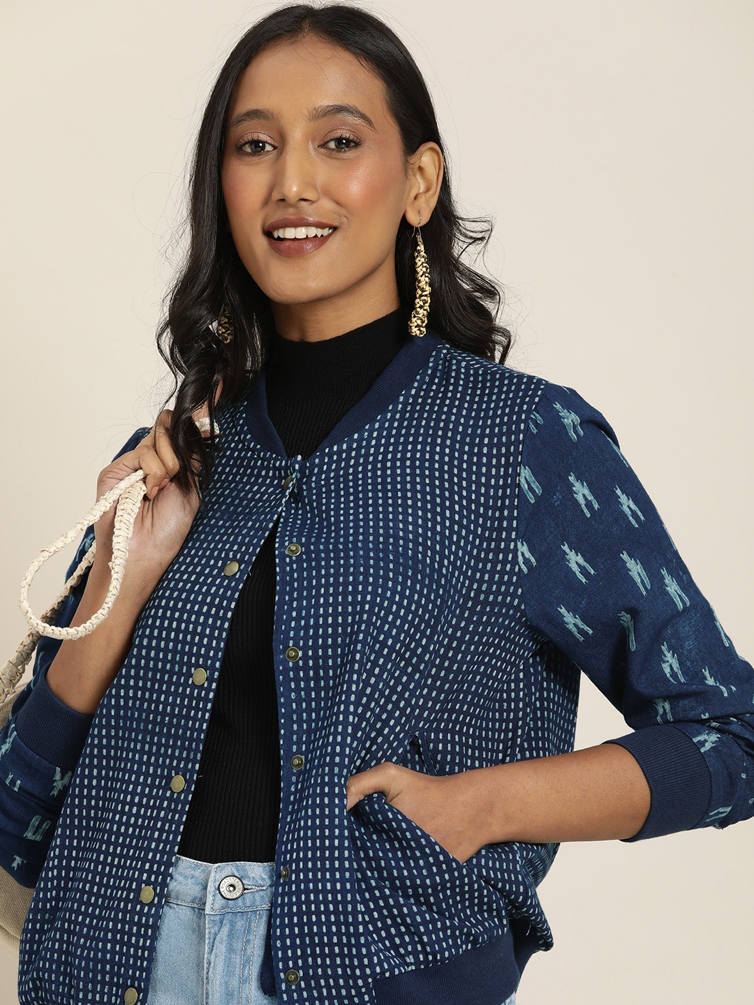 Taavi Women Navy Blue & White Indigo Hand Block Printed Jacket with Contrast Print Sleeves
Taavi Women Navy Blue & White Indigo Hand Block Printed Jacket with Contrast Print Sleeves