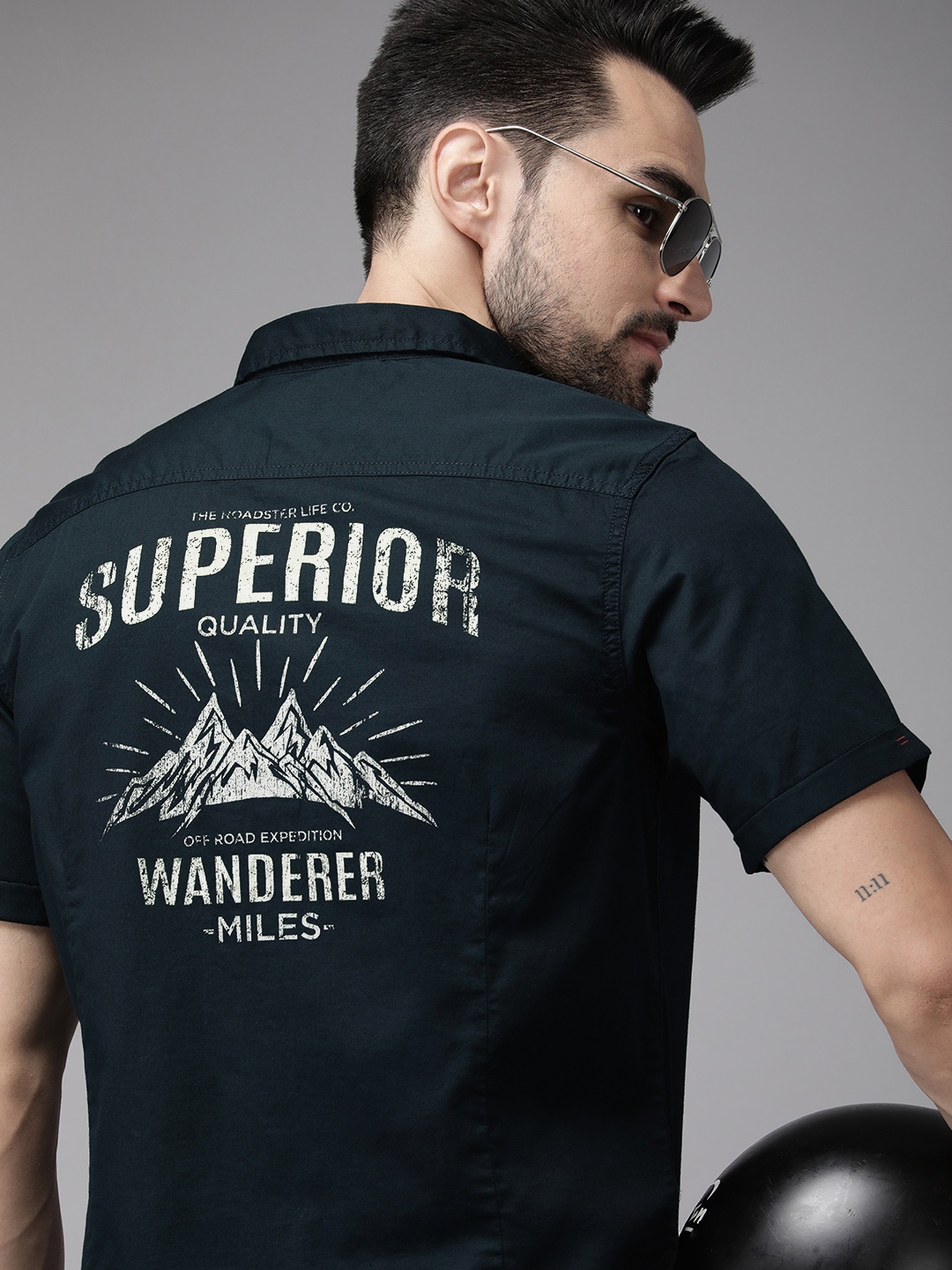 The Roadster Lifestyle Co. Men Navy Blue Graphic Printed Slim Fit Pure Cotton Sustainable Shirt
The Roadster Lifestyle Co. Men Navy Blue Graphic Printed Slim Fit Pure Cotton Sustainable Shirt