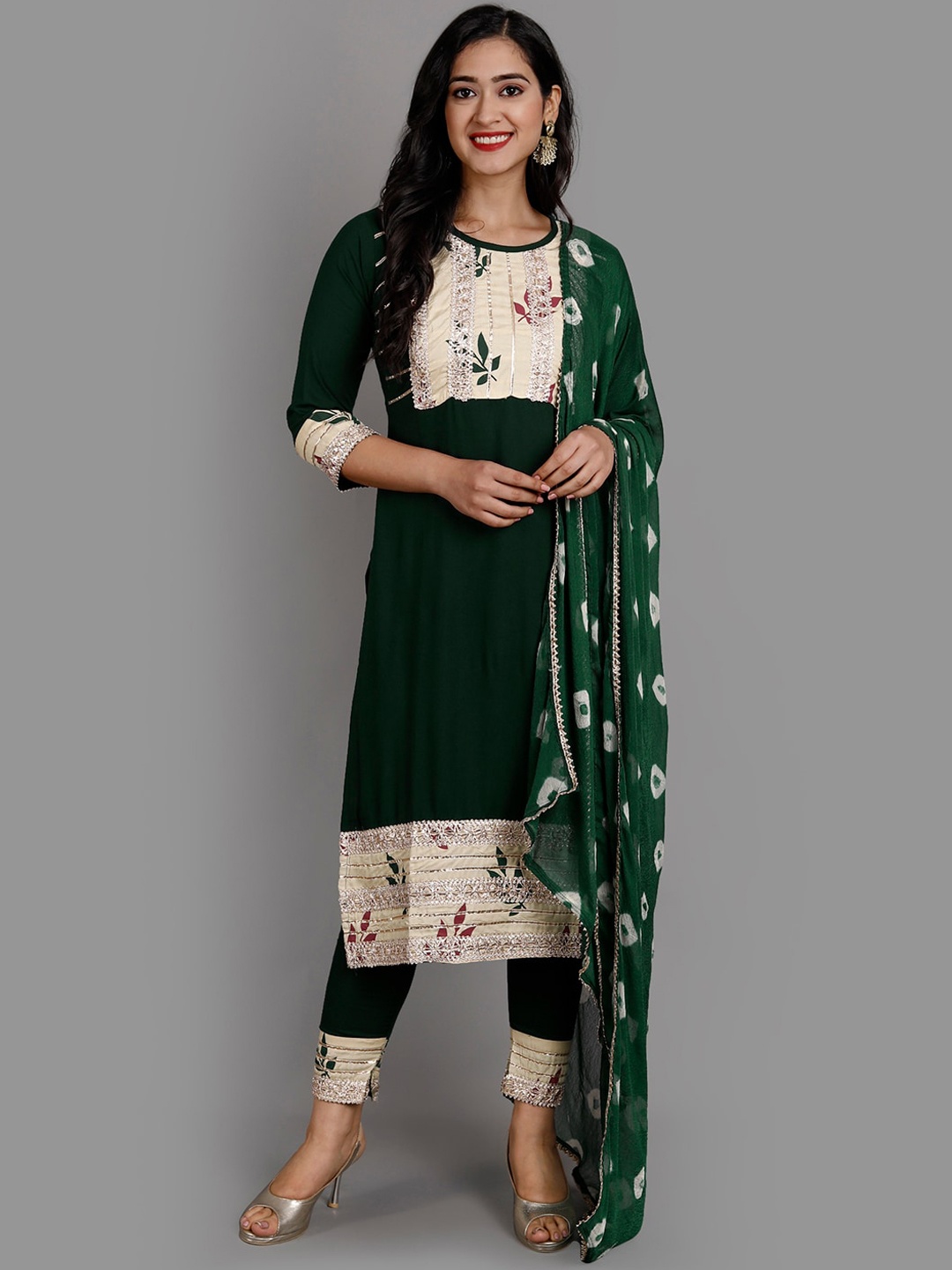 Ziva Fashion Women Green Floral Yoke Design Panelled Top with Trousers & With Dupatta
Ziva Fashion Women Green Floral Yoke Design Panelled Top with Trousers & With Dupatta
