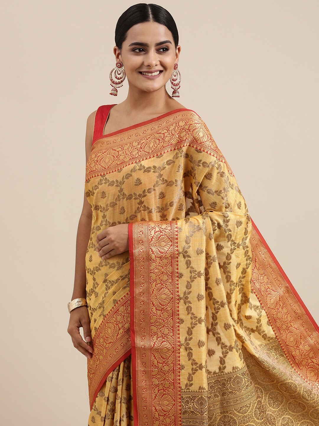 Mitera Cream-Coloured & Golden Ethnic Motifs Woven Design Silk Cotton Chanderi Saree
Mitera Cream-Coloured & Golden Ethnic Motifs Woven Design Silk Cotton Chanderi Saree